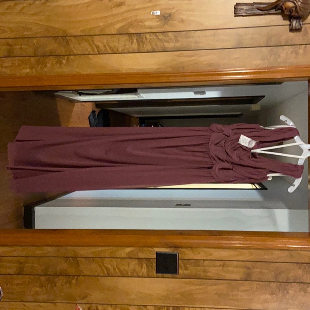Brand new Brides maid dress never worn still has the tags